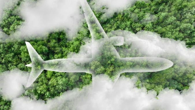 Outline of a plane, surrounded by clouds, flying over a forest (sustainable aviation fuel concept) 