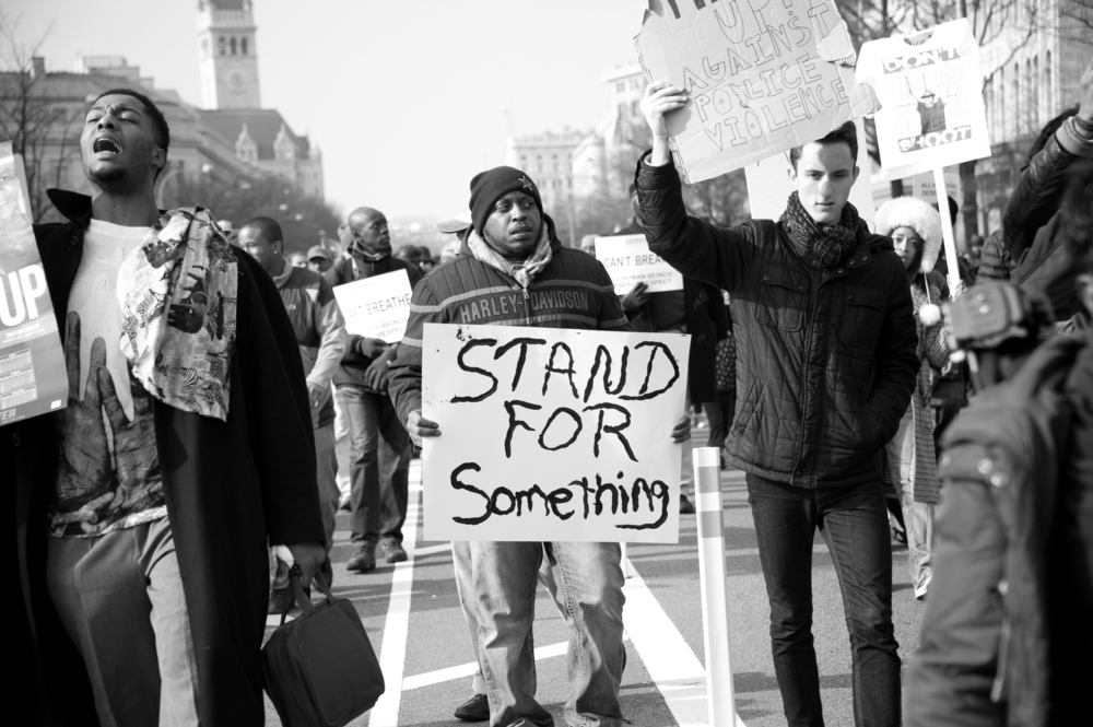 Protesters march against police shootings and racism during a rally Dec. 13, 2014 in Washington, D.C.