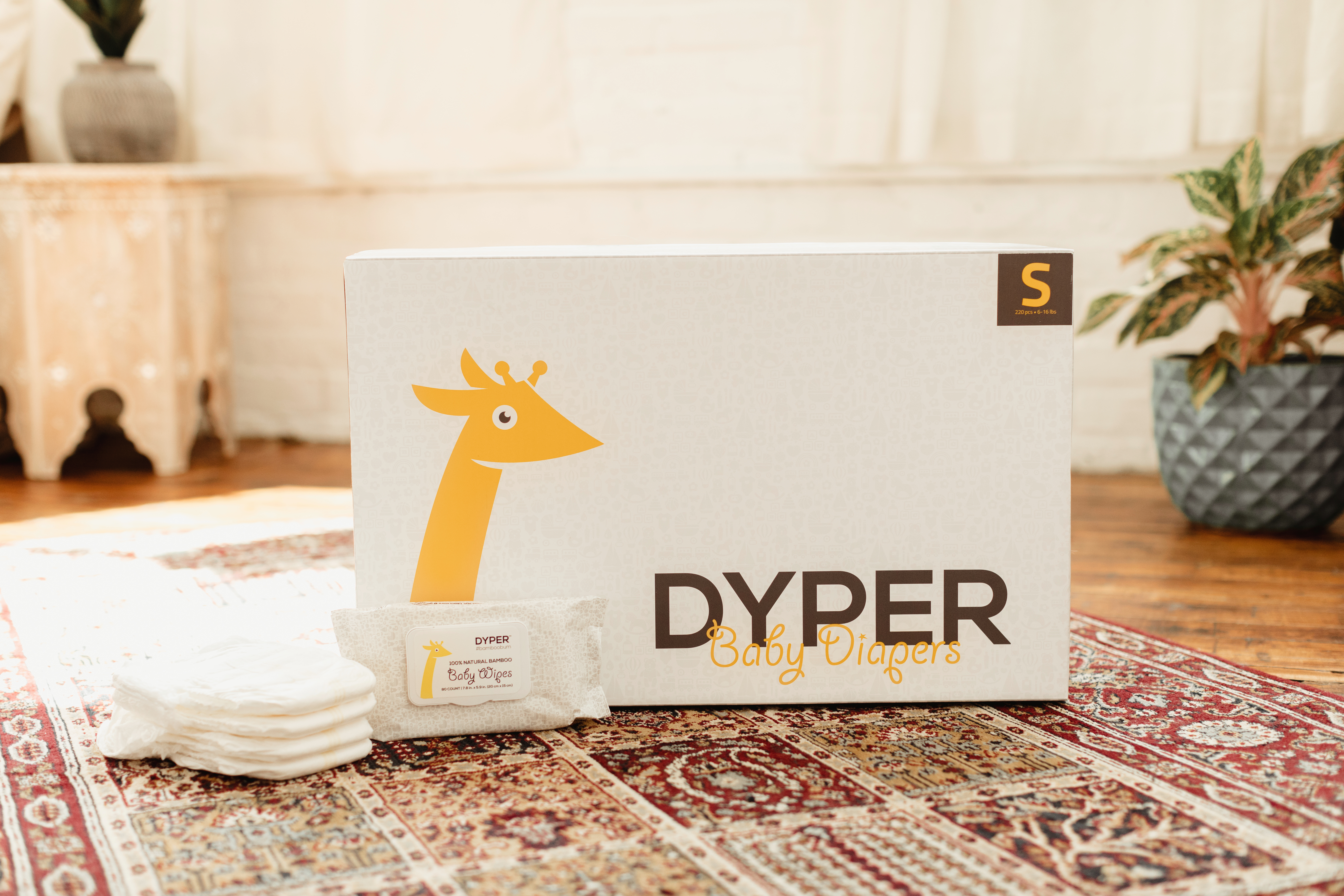 Dyper diaper box pictured with baby wipes