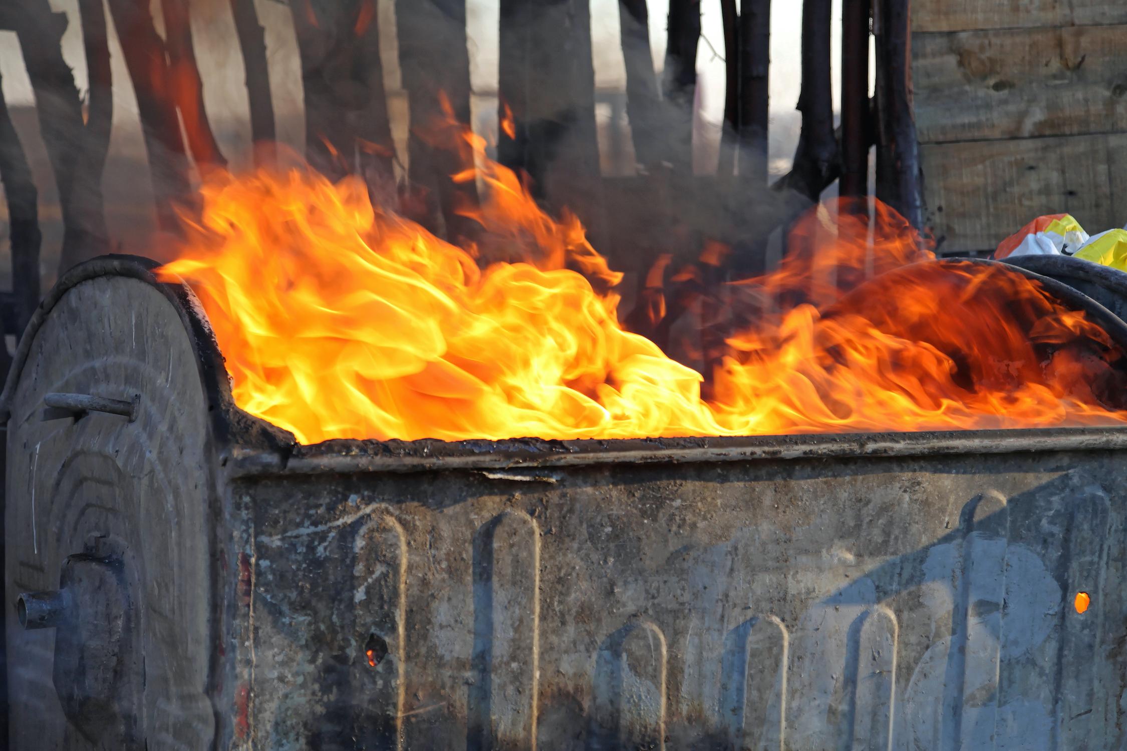 Burning trask in a dumpster