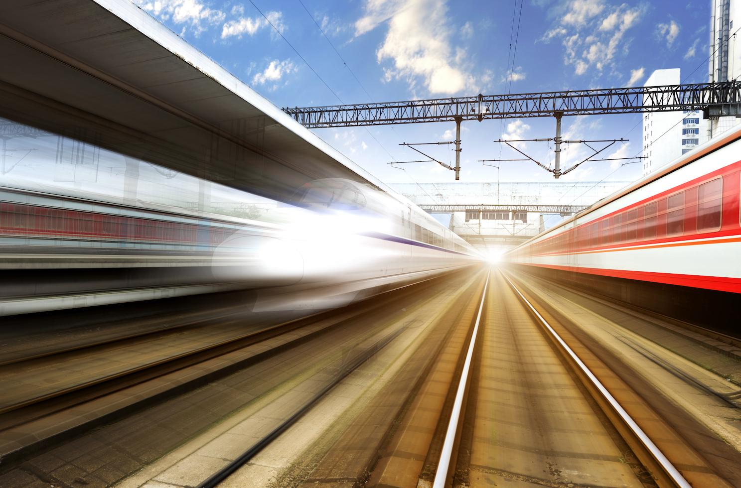 Blurred image of two high-speed trains