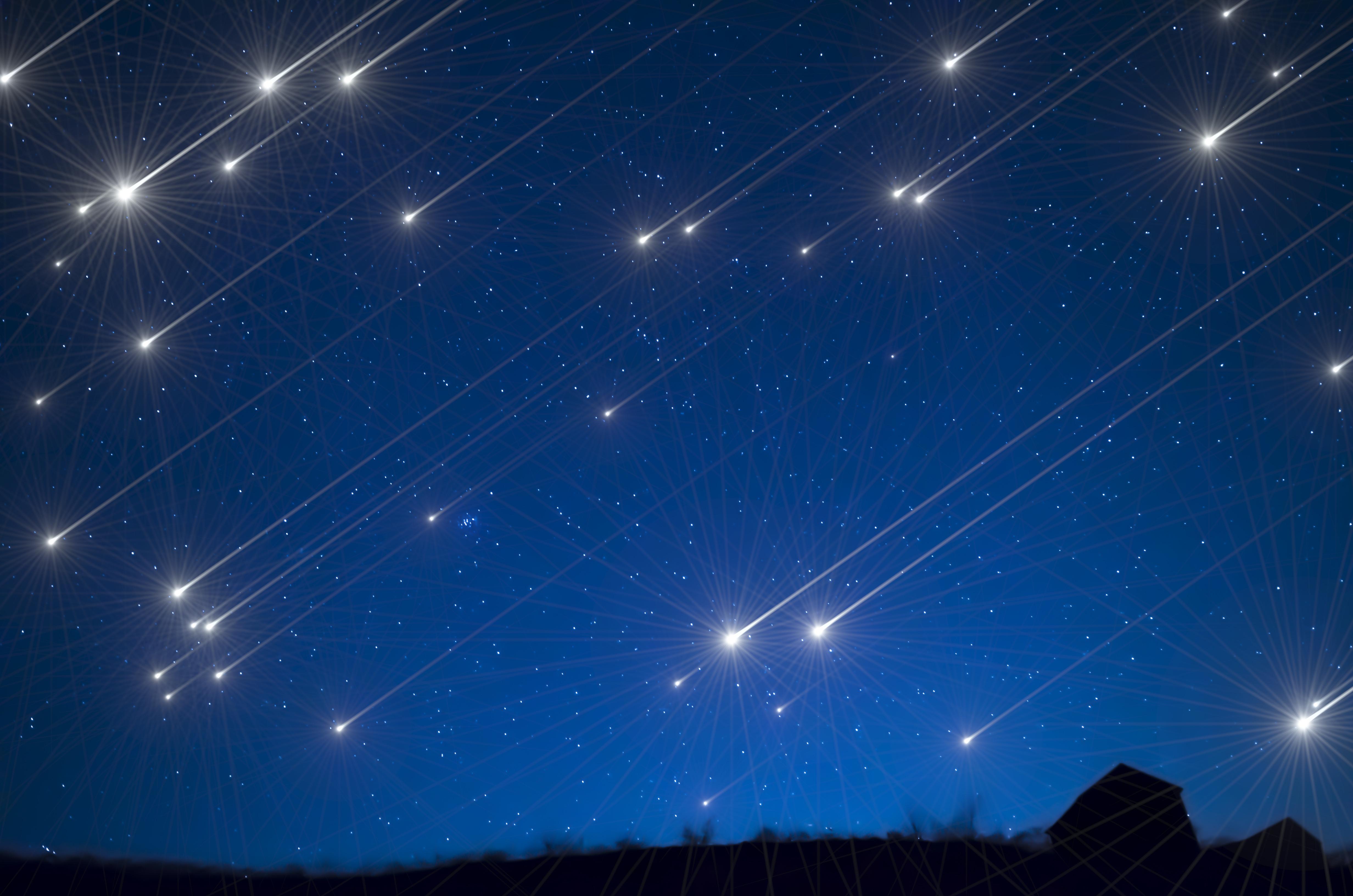 A picture of a night sky alight with shooting stars