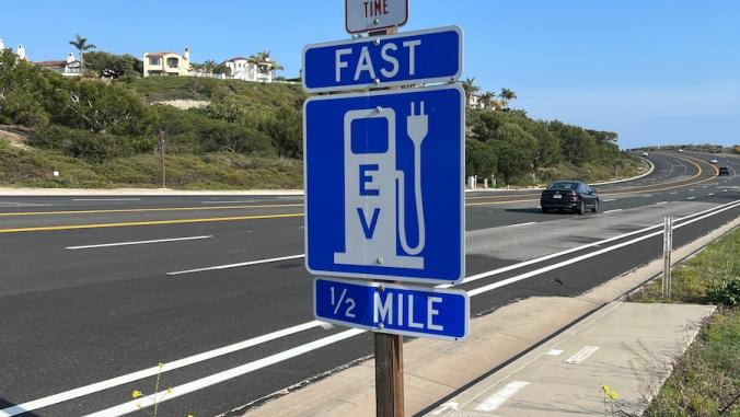 Road sign for EV fast-charging station