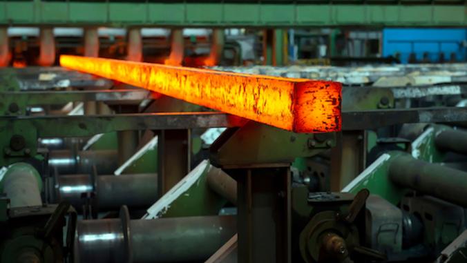 Steel production in electric furnaces. Sparks of molten steel.